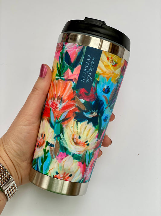 A thermal flask featuring a vibrant floral painting design, titled "Fresh Excitement." The design includes colourful flowers and delicate greenery, evoking a sense of energy and freshness.